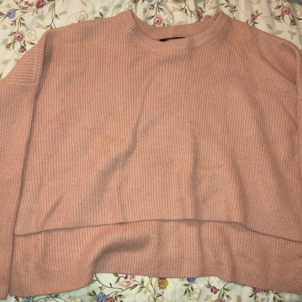 I am selling a nude pink crop top sweater